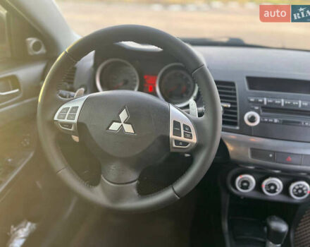 Черный Мицубиси Лансер, объемом двигателя 2 л и пробегом 193 тыс. км за 7500 $, фото 9 на Automoto.ua