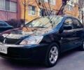 Чорний Міцубісі Lancer, об'ємом двигуна 0.16 л та пробігом 189 тис. км за 5000 $, фото 1 на Automoto.ua