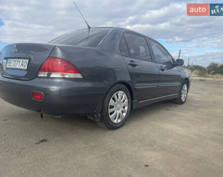 Чорний Міцубісі Lancer, об'ємом двигуна 1.6 л та пробігом 162 тис. км за 4650 $, фото 6 на Automoto.ua