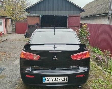 Чорний Міцубісі Lancer, об'ємом двигуна 2 л та пробігом 273 тис. км за 7100 $, фото 2 на Automoto.ua