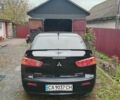 Чорний Міцубісі Lancer, об'ємом двигуна 2 л та пробігом 273 тис. км за 7100 $, фото 2 на Automoto.ua