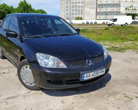 Чорний Міцубісі Lancer, об'ємом двигуна 1.6 л та пробігом 283 тис. км за 3999 $, фото 4 на Automoto.ua