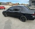 Чорний Міцубісі Lancer, об'ємом двигуна 1.6 л та пробігом 250 тис. км за 4800 $, фото 1 на Automoto.ua