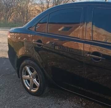 Черный Мицубиси Лансер, объемом двигателя 1.5 л и пробегом 270 тыс. км за 4999 $, фото 4 на Automoto.ua