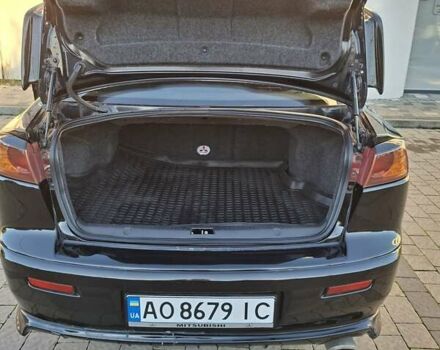 Мицубиси Лансер 2007 в Ужгороде на Automoto.ua Черный Мицубиси Лансер, объемом двигателя 2 л и пробегом 256 тыс. км за 7200 $, фото 10 на Automoto.ua