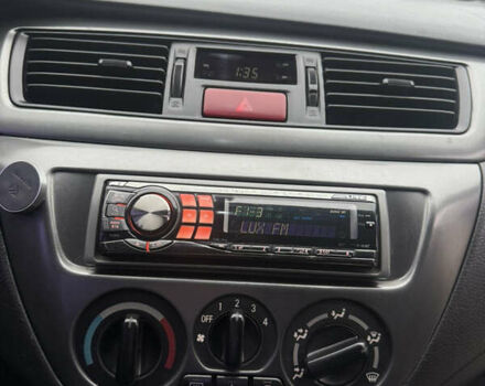 Чорний Міцубісі Lancer, об'ємом двигуна 1.58 л та пробігом 256 тис. км за 3700 $, фото 25 на Automoto.ua