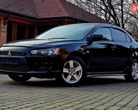 Чорний Міцубісі Lancer, об'ємом двигуна 2 л та пробігом 260 тис. км за 6555 $, фото 1 на Automoto.ua