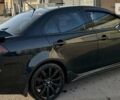 Чорний Міцубісі Lancer, об'ємом двигуна 2 л та пробігом 274 тис. км за 6900 $, фото 2 на Automoto.ua