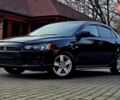 Чорний Міцубісі Lancer, об'ємом двигуна 2 л та пробігом 260 тис. км за 6555 $, фото 1 на Automoto.ua