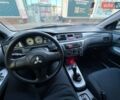 Чорний Міцубісі Lancer, об'ємом двигуна 1.58 л та пробігом 184 тис. км за 5500 $, фото 15 на Automoto.ua