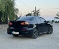 Черный Мицубиси Лансер, объемом двигателя 1.5 л и пробегом 275 тыс. км за 6300 $, фото 1 на Automoto.ua