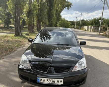 Черный Мицубиси Лансер, объемом двигателя 1.6 л и пробегом 244 тыс. км за 4500 $, фото 3 на Automoto.ua