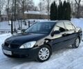 Черный Мицубиси Лансер, объемом двигателя 1.6 л и пробегом 192 тыс. км за 4950 $, фото 1 на Automoto.ua