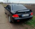 Черный Мицубиси Лансер, объемом двигателя 1.6 л и пробегом 202 тыс. км за 4800 $, фото 1 на Automoto.ua