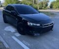 Чорний Міцубісі Lancer, об'ємом двигуна 2 л та пробігом 240 тис. км за 6001 $, фото 1 на Automoto.ua
