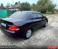 Черный Мицубиси Лансер, объемом двигателя 1.6 л и пробегом 240 тыс. км за 5000 $, фото 5 на Automoto.ua