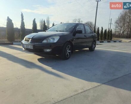 Чорний Міцубісі Lancer, об'ємом двигуна 1.59 л та пробігом 180 тис. км за 4999 $, фото 2 на Automoto.ua
