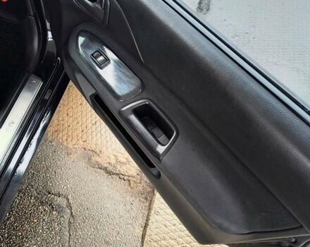 Черный Мицубиси Лансер, объемом двигателя 1.6 л и пробегом 309 тыс. км за 4000 $, фото 9 на Automoto.ua