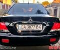Черный Мицубиси Лансер, объемом двигателя 1.6 л и пробегом 163 тыс. км за 5000 $, фото 12 на Automoto.ua