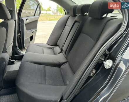 Чорний Міцубісі Lancer, об'ємом двигуна 2 л та пробігом 192 тис. км за 6500 $, фото 18 на Automoto.ua