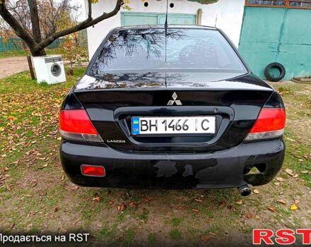 Чорний Міцубісі Lancer, об'ємом двигуна 1.6 л та пробігом 227 тис. км за 4100 $, фото 2 на Automoto.ua