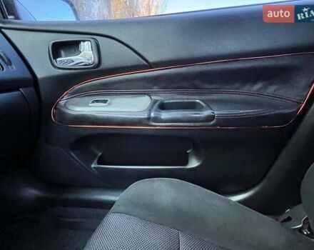 Черный Мицубиси Лансер, объемом двигателя 2 л и пробегом 280 тыс. км за 5400 $, фото 17 на Automoto.ua