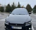 Черный Мицубиси Лансер, объемом двигателя 2 л и пробегом 182 тыс. км за 6999 $, фото 6 на Automoto.ua