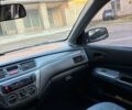 Чорний Міцубісі Lancer, об'ємом двигуна 1.59 л та пробігом 234 тис. км за 4250 $, фото 11 на Automoto.ua