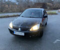 Чорний Міцубісі Lancer, об'ємом двигуна 1.58 л та пробігом 280 тис. км за 3650 $, фото 10 на Automoto.ua
