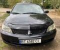 Чорний Міцубісі Lancer, об'ємом двигуна 1.58 л та пробігом 231 тис. км за 4300 $, фото 3 на Automoto.ua