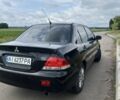 Черный Мицубиси Лансер, объемом двигателя 1.6 л и пробегом 3 тыс. км за 5900 $, фото 1 на Automoto.ua