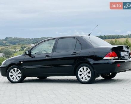 Чорний Міцубісі Lancer, об'ємом двигуна 1.6 л та пробігом 243 тис. км за 4950 $, фото 2 на Automoto.ua