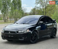 Чорний Міцубісі Lancer, об'ємом двигуна 2 л та пробігом 192 тис. км за 6500 $, фото 1 на Automoto.ua