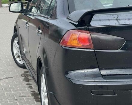 Черный Мицубиси Лансер, объемом двигателя 2 л и пробегом 350 тыс. км за 4299 $, фото 5 на Automoto.ua