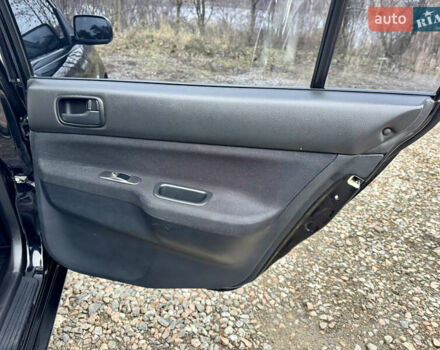 Черный Мицубиси Лансер, объемом двигателя 1.6 л и пробегом 216 тыс. км за 4990 $, фото 16 на Automoto.ua