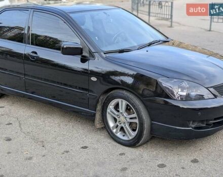 Чорний Міцубісі Lancer, об'ємом двигуна 2 л та пробігом 152 тис. км за 5500 $, фото 2 на Automoto.ua