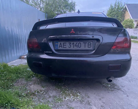 Чорний Міцубісі Lancer, об'ємом двигуна 1.6 л та пробігом 195 тис. км за 5200 $, фото 26 на Automoto.ua