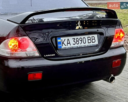 Чорний Міцубісі Lancer, об'ємом двигуна 1.6 л та пробігом 303 тис. км за 4350 $, фото 14 на Automoto.ua