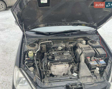 Чорний Міцубісі Lancer, об'ємом двигуна 1.58 л та пробігом 199 тис. км за 4400 $, фото 35 на Automoto.ua