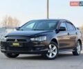 Чорний Міцубісі Lancer, об'ємом двигуна 2 л та пробігом 228 тис. км за 6950 $, фото 1 на Automoto.ua