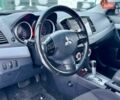 Черный Мицубиси Лансер, объемом двигателя 2 л и пробегом 215 тыс. км за 6300 $, фото 17 на Automoto.ua