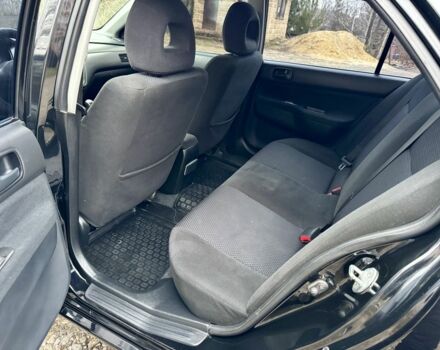 Чорний Міцубісі Lancer, об'ємом двигуна 1.6 л та пробігом 216 тис. км за 4990 $, фото 13 на Automoto.ua