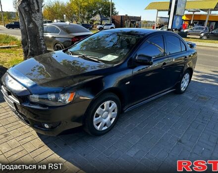 Черный Мицубиси Лансер, объемом двигателя 2 л и пробегом 250 тыс. км за 5900 $, фото 4 на Automoto.ua