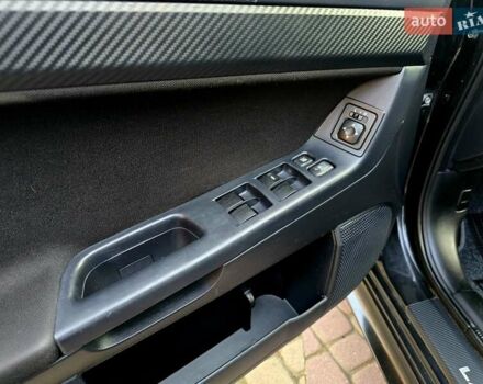 Чорний Міцубісі Lancer, об'ємом двигуна 2 л та пробігом 260 тис. км за 6555 $, фото 20 на Automoto.ua