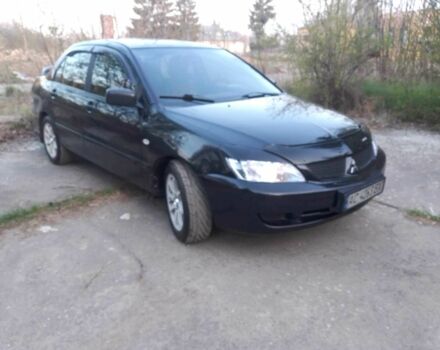 Чорний Міцубісі Lancer, об'ємом двигуна 0.16 л та пробігом 235 тис. км за 4000 $, фото 3 на Automoto.ua