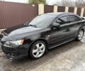 Чорний Міцубісі Lancer, об'ємом двигуна 2 л та пробігом 188 тис. км за 6300 $, фото 1 на Automoto.ua