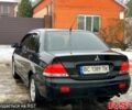 Черный Мицубиси Лансер, объемом двигателя 1.6 л и пробегом 180 тыс. км за 3800 $, фото 6 на Automoto.ua