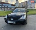 Черный Мицубиси Лансер, объемом двигателя 1.58 л и пробегом 237 тыс. км за 3999 $, фото 1 на Automoto.ua