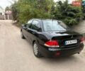 Чорний Міцубісі Lancer, об'ємом двигуна 1.58 л та пробігом 225 тис. км за 4180 $, фото 4 на Automoto.ua