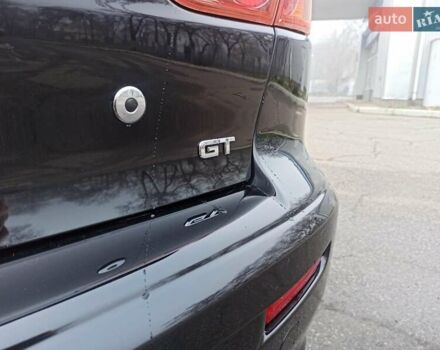 Черный Мицубиси Лансер, объемом двигателя 2 л и пробегом 195 тыс. км за 7899 $, фото 31 на Automoto.ua